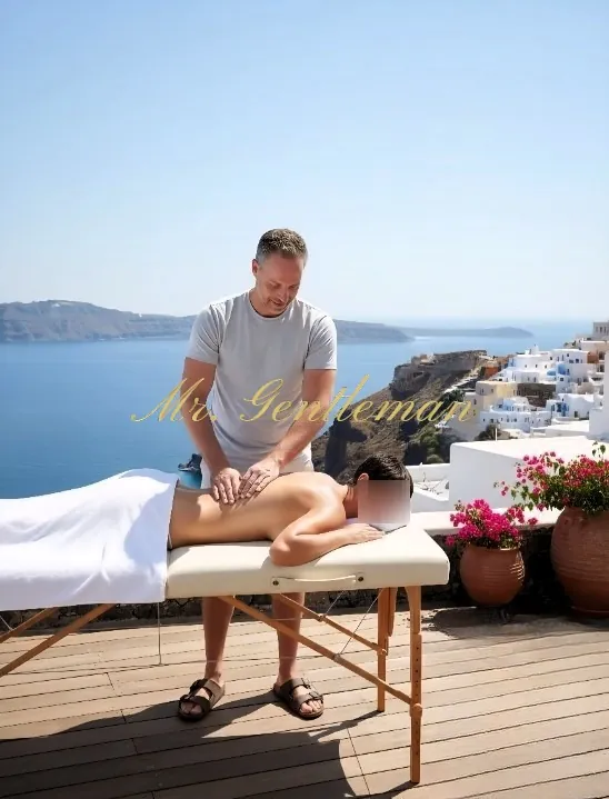 Mr. Gentleman giving a massage on a sunny sea-view terrace in Istron, Crete